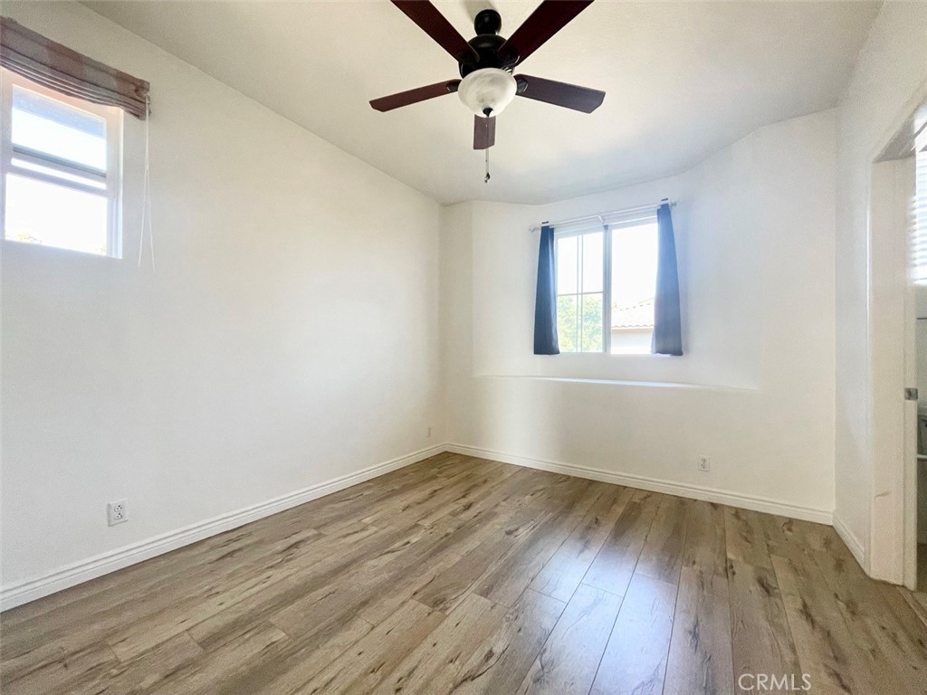 65 Passage Irvine, CA 92603 - Photo 25 of 28 wooden floor in an empty room with a window
