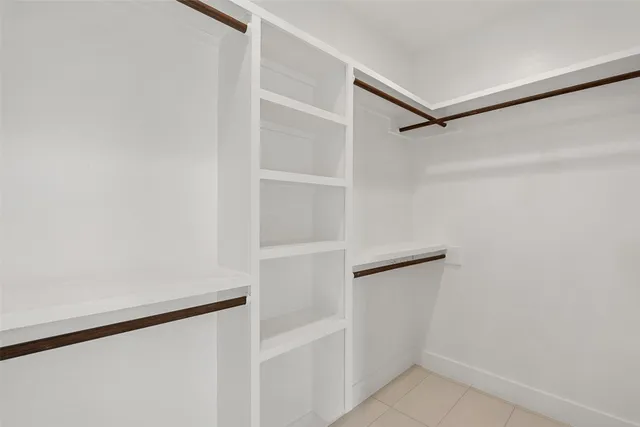 a view of an empty walk in closet
