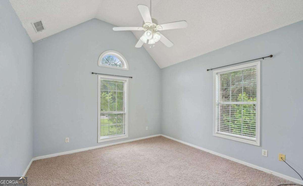 1535 Lake Dow Road McDonough, GA 30252 - Photo 7 of 9 a view of an empty room with a window
