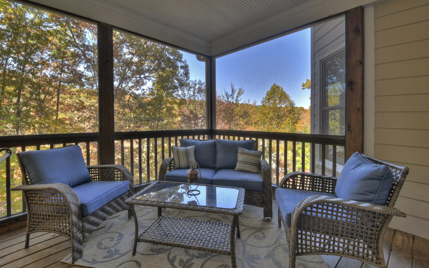 159 Meadowlark Lane Blue Ridge, GA 30513 - Photo 15 of 54 a roof deck with couches and wooden floor