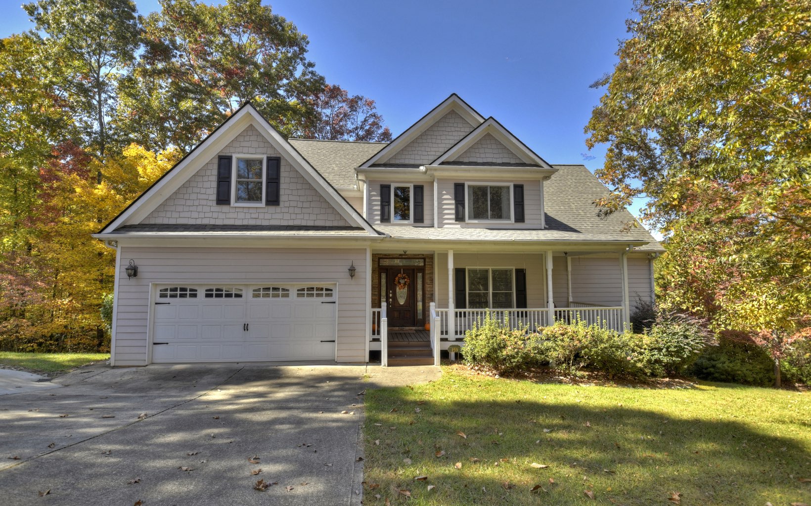 159 Meadowlark Lane Blue Ridge, GA 30513 - Photo 2 of 54 a front view of a house with a yard