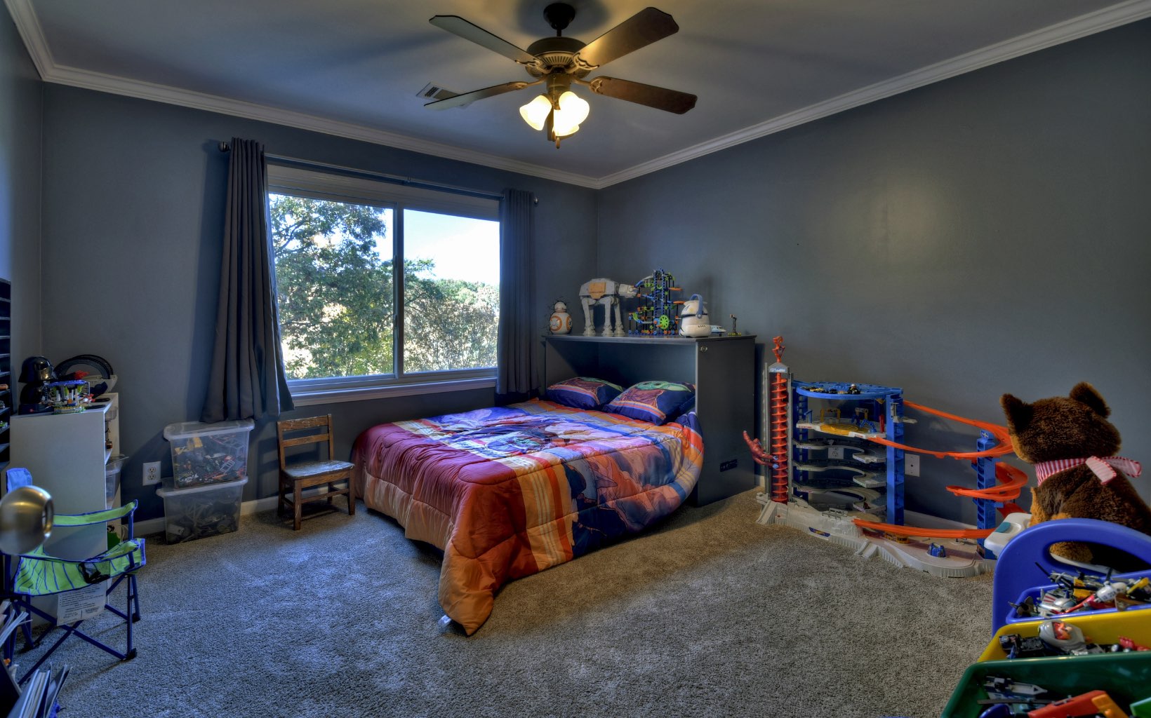 159 Meadowlark Lane Blue Ridge, GA 30513 - Photo 26 of 54 a bedroom with a bed and a chandelier