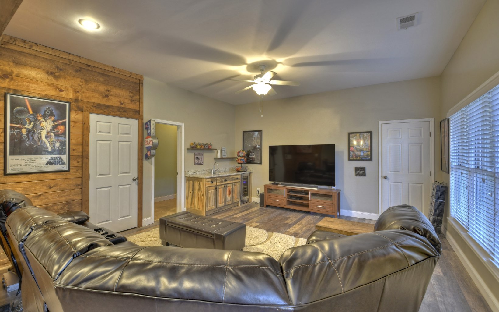 159 Meadowlark Lane Blue Ridge, GA 30513 - Photo 36 of 54 a living room with furniture and a flat screen tv