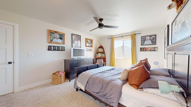 1127 4240 North Enoch, UT 84721 - Photo 41 of 56 Bedroom featuring carpet floors and ceiling fan