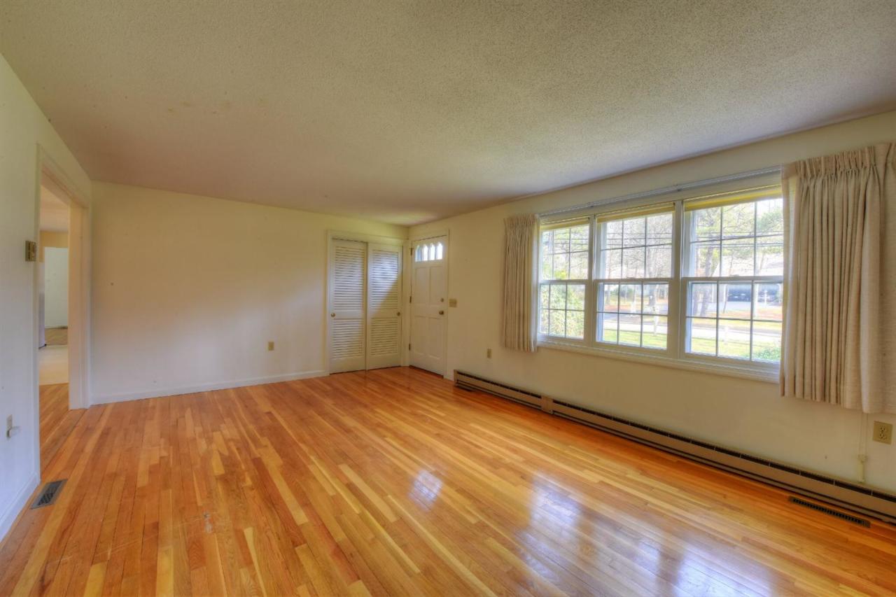 1394 Old Post Road Marstons Mills, MA 02648 - Photo 11 of 35 a view of an empty room and window