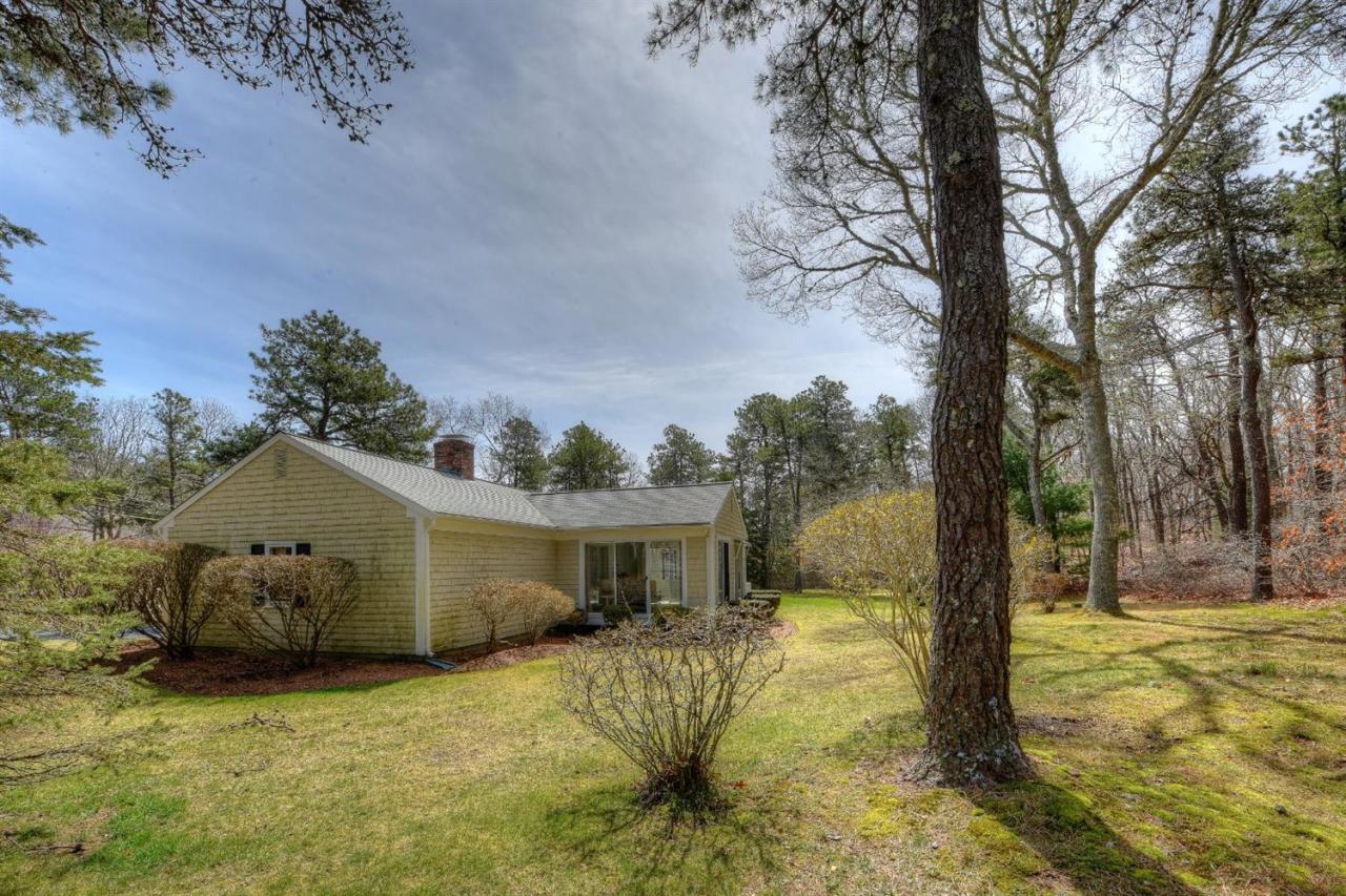 1394 Old Post Road Marstons Mills, MA 02648 - Photo 5 of 35 a view of a house with a yard