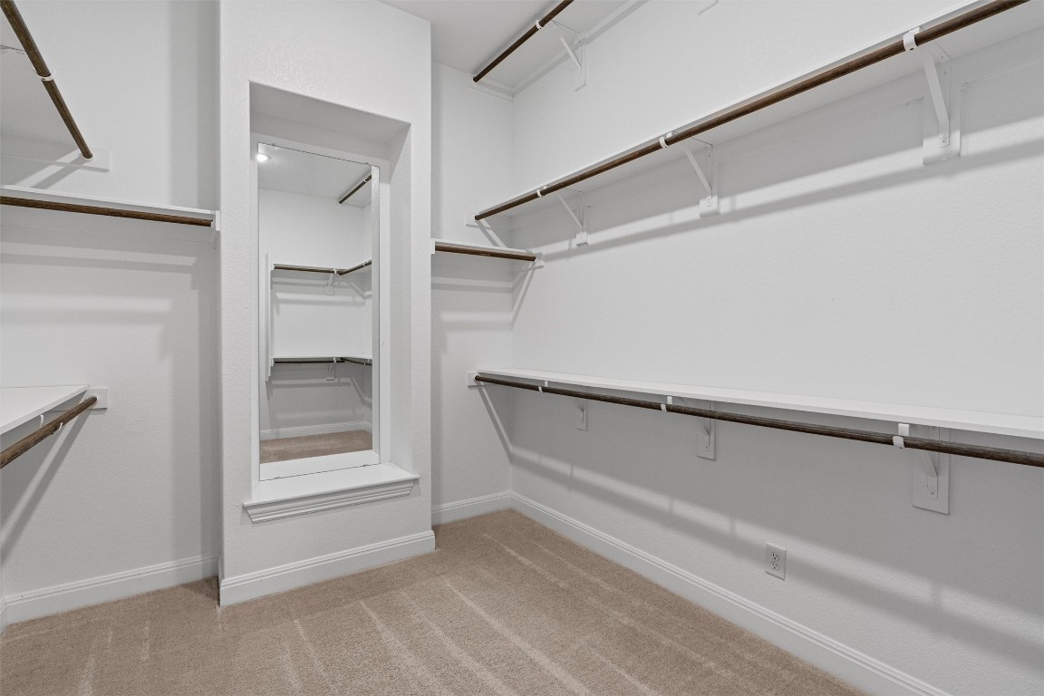 2328 Lucky Lane Leander, TX 78641 - Photo 17 of 40 a view of an empty walk in closet