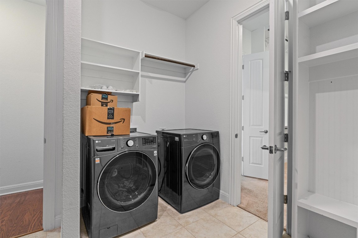 2328 Lucky Lane Leander, TX 78641 - Photo 18 of 40 a utility room with dryer and washer