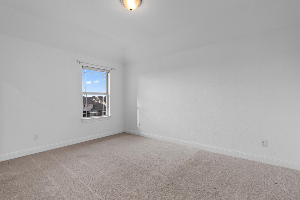 2328 Lucky Lane Leander, TX 78641 - Photo 30 of 40 a view of an empty room with a window