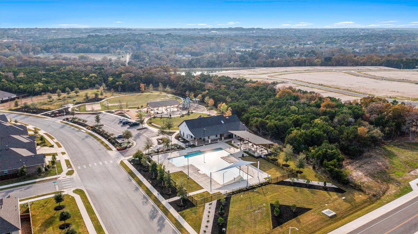 2328 Lucky Lane Leander, TX 78641 - Photo 36 of 40 a view of a swimming pool with lounge chairs