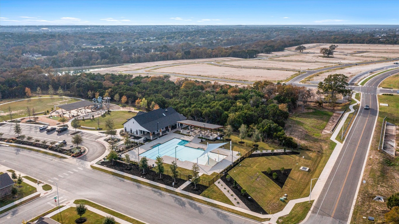 2328 Lucky Lane Leander, TX 78641 - Photo 37 of 40 a view of a swimming pool with an outdoor seating