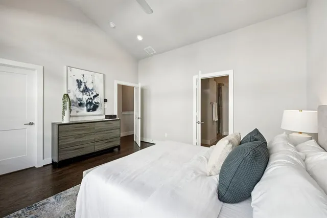 a bedroom with a bed and closet