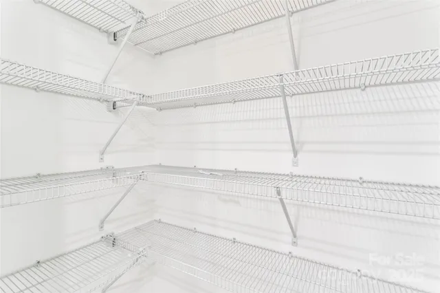 a bathroom with a shower and a shower