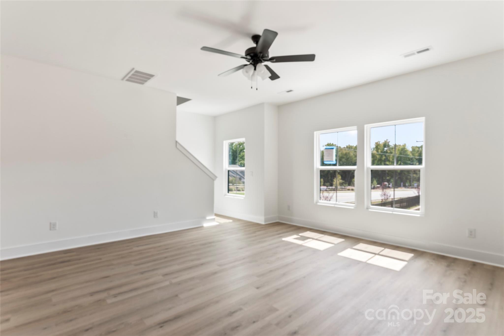 410 Bogue Drive, Unit 19 Fort Mill, SC 29708 - Photo 20 of 48 wooden floor in an empty room with a window