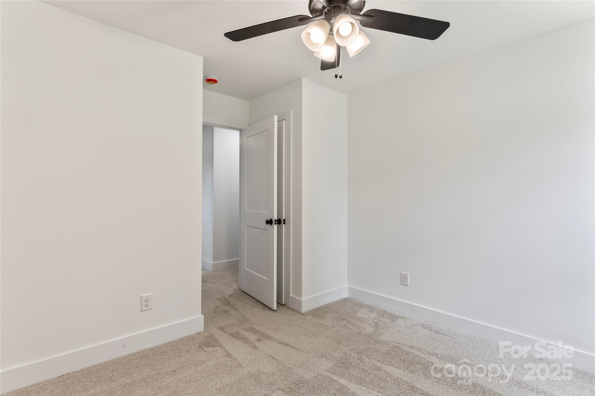 410 Bogue Drive, Unit 19 Fort Mill, SC 29708 - Photo 31 of 48 an empty room with a view of a bathroom