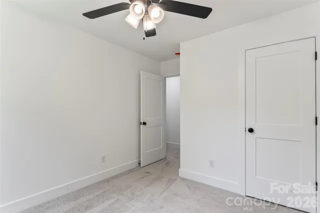 a bathroom with a sink and cabinets