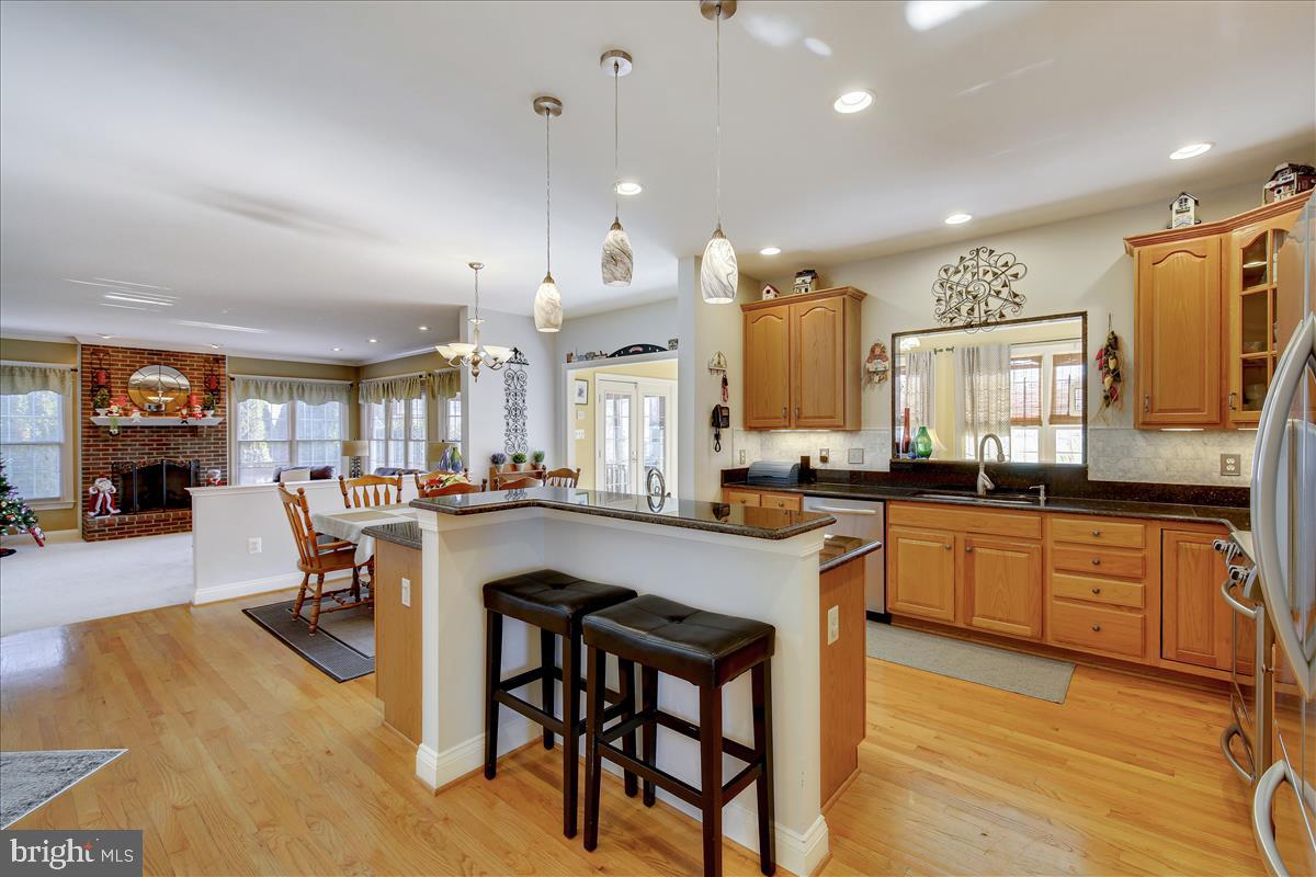 18267 Wickham Road Olney, MD 20832 - Photo 22 of 107 Kitchen opens to cozy Family Room