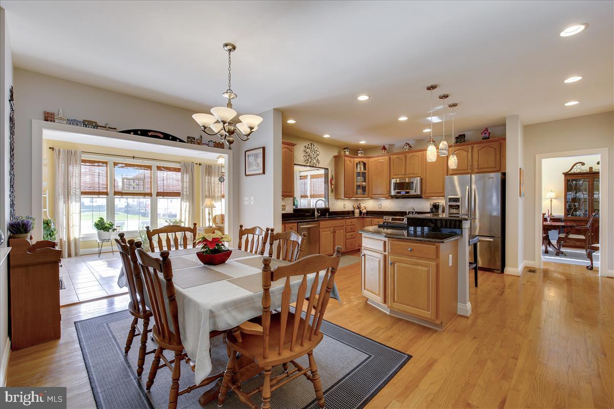 18267 Wickham Road Olney, MD 20832 - Photo 23 of 107 Kitchen opens to large, bright Sunroom