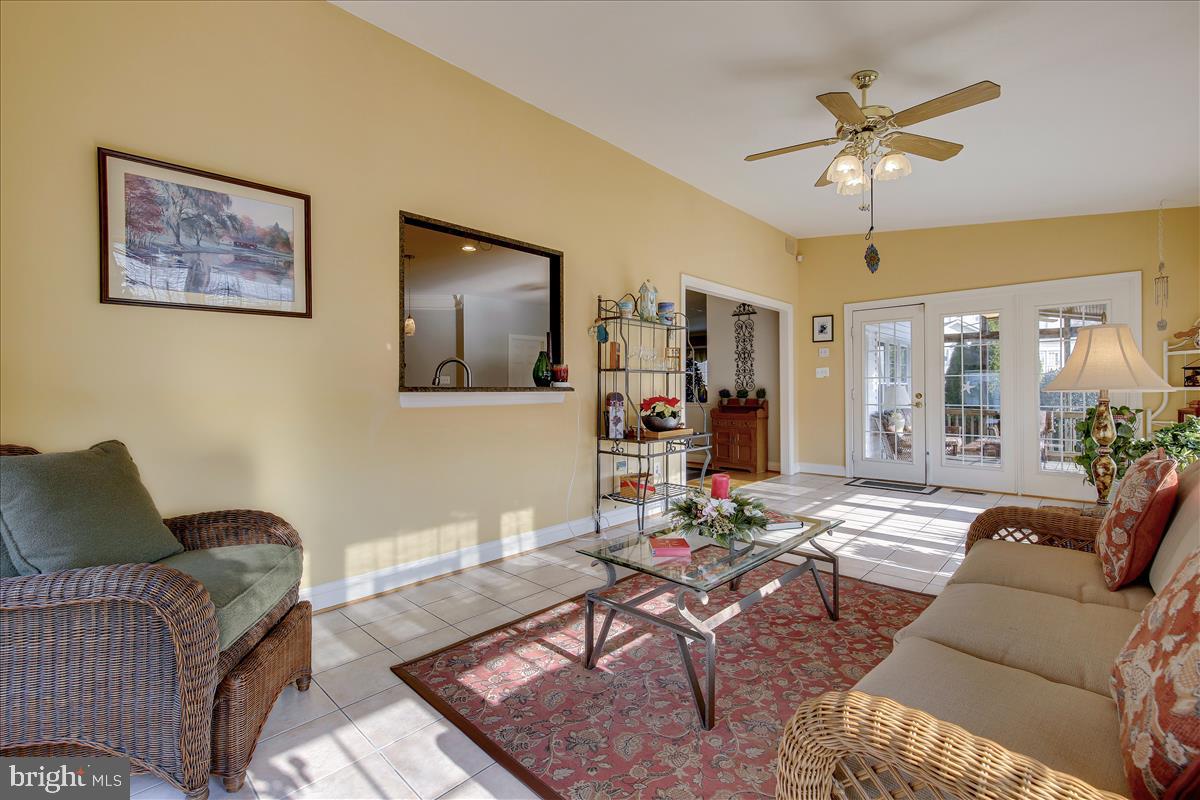 18267 Wickham Road Olney, MD 20832 - Photo 33 of 107 Sunroom leads to screened-in porch
