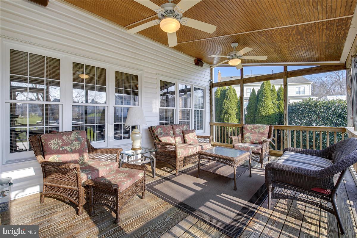18267 Wickham Road Olney, MD 20832 - Photo 36 of 107 Large, screened-in porch with ceiling fan