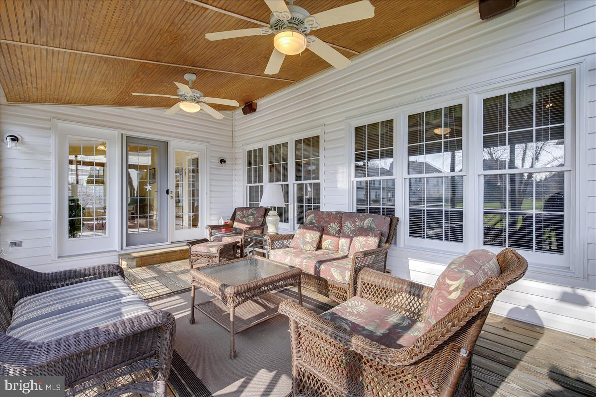 18267 Wickham Road Olney, MD 20832 - Photo 37 of 107 Screened-in porch leads to deck