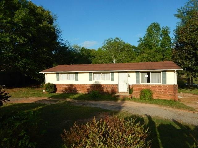 65 Kennedy Estate Road Carrollton, GA 30116 - Photo 1 of 1 a front view of a house with garden