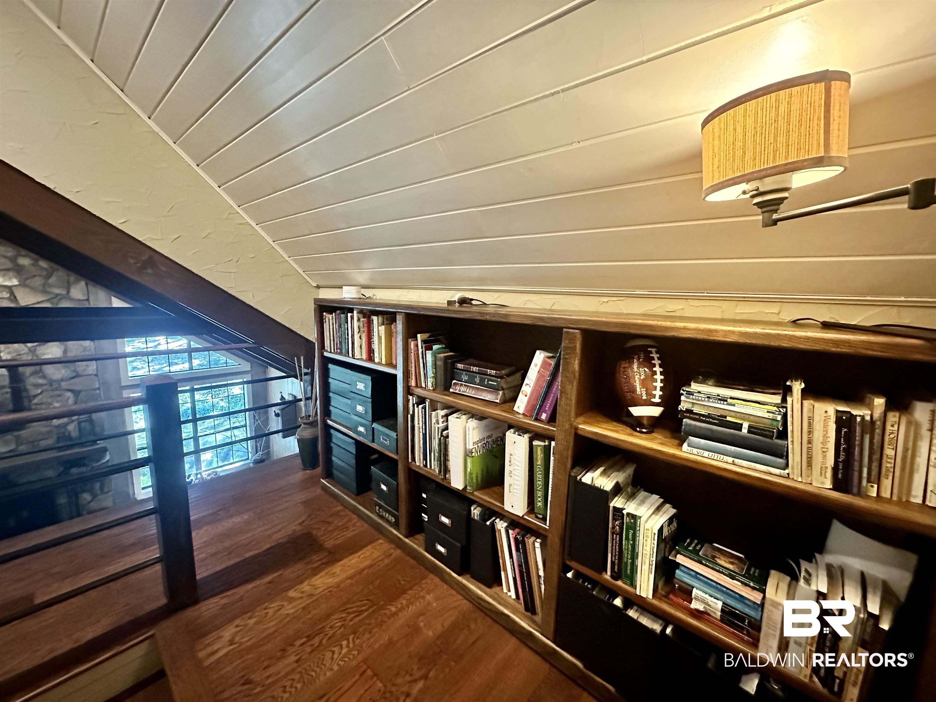 117 Belle Meade Brewton, AL 36426 - Photo 27 of 62 Corridor featuring lofted ceiling and dark hardwood / wood-style flooring