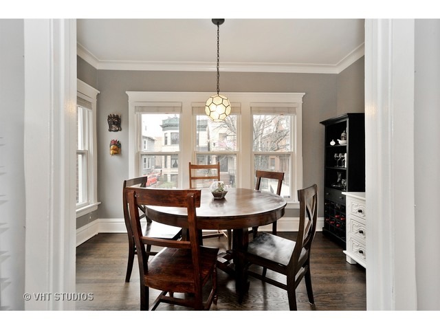 725 West Buckingham Place, Unit 1 Chicago, IL 60657 - Photo 10 of 12 a view of a dining room with furniture window and outside view