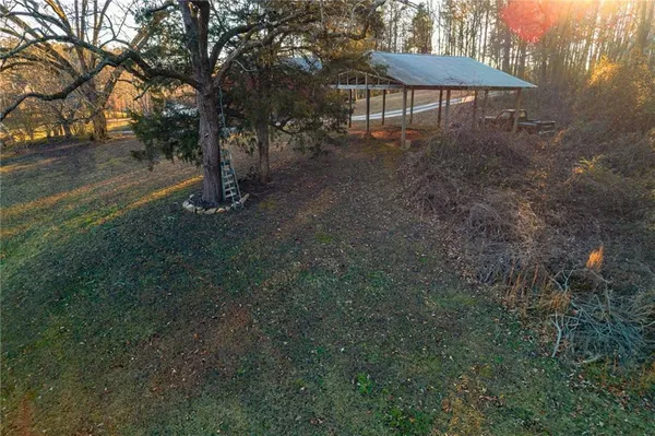 a view of a backyard of a house
