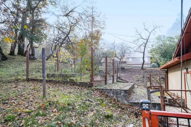 a backyard of a house with lots of green space