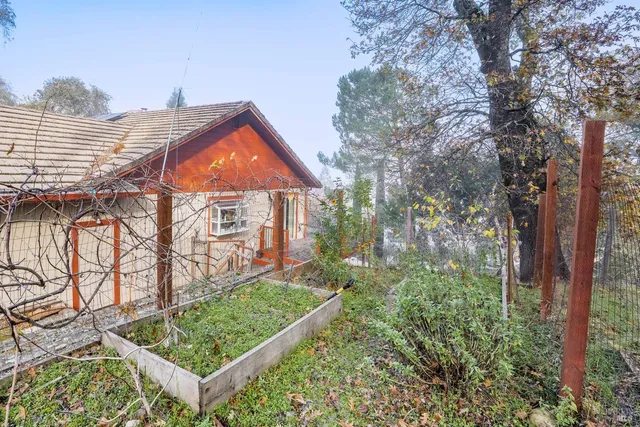a backyard of a house with lots of green space