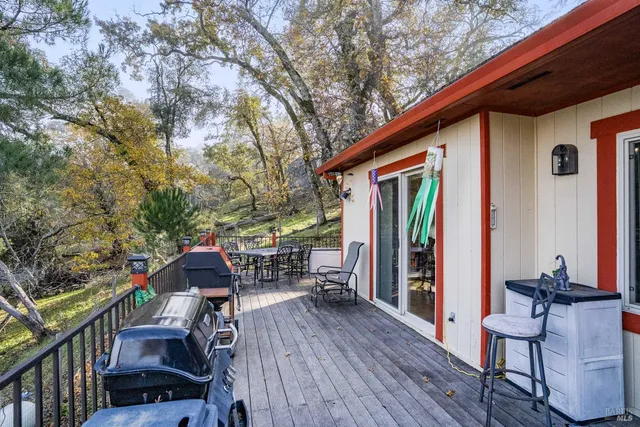 a balcony view with a seating space