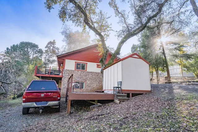a house view with a backyard space