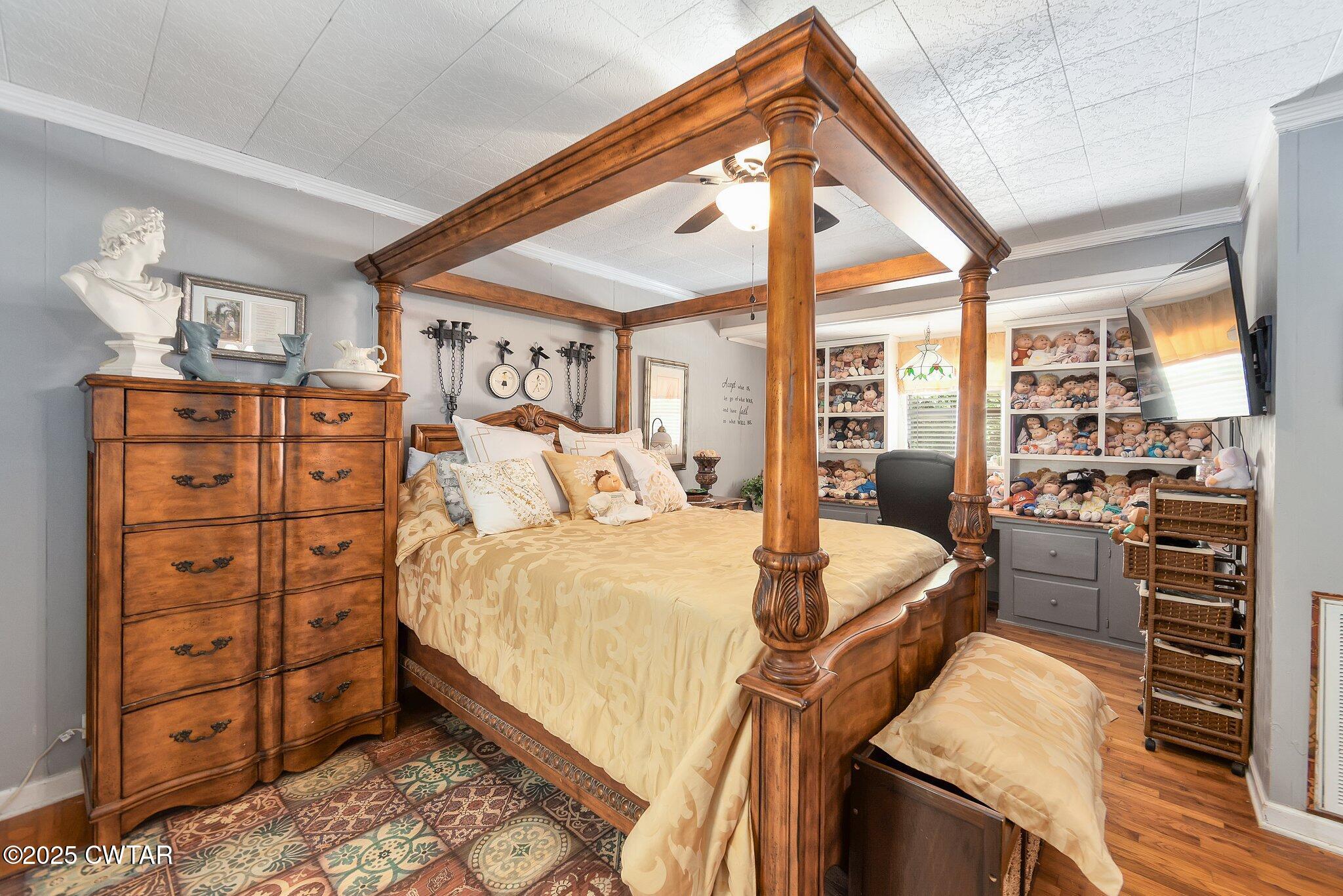 3600 Pine Top Road Toone, TN 38381 - Photo 18 of 39 a bed room with a bed and a dresser