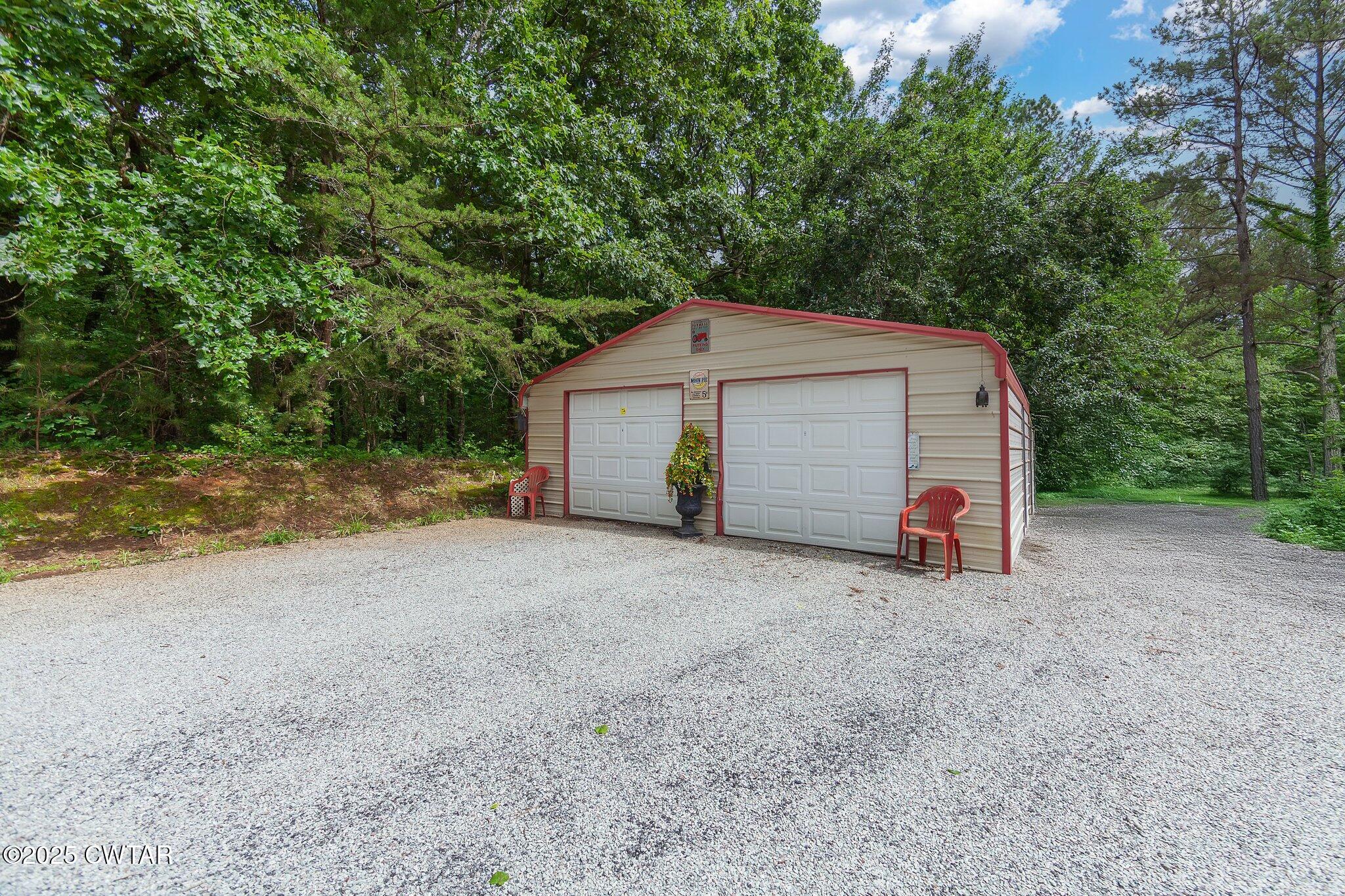 3600 Pine Top Road Toone, TN 38381 - Photo 5 of 39 a view of a house with a backyard