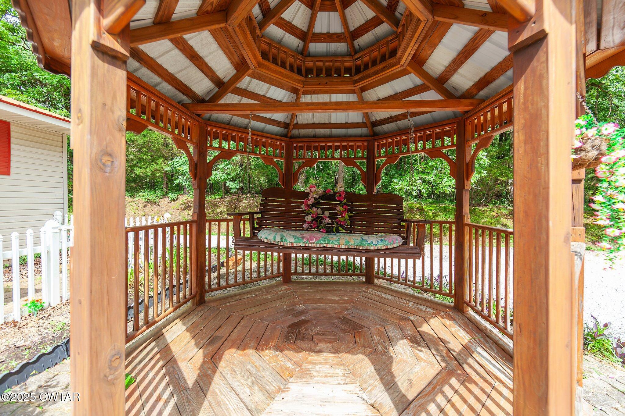 3600 Pine Top Road Toone, TN 38381 - Photo 9 of 39 a view of a shaded area in a balcony