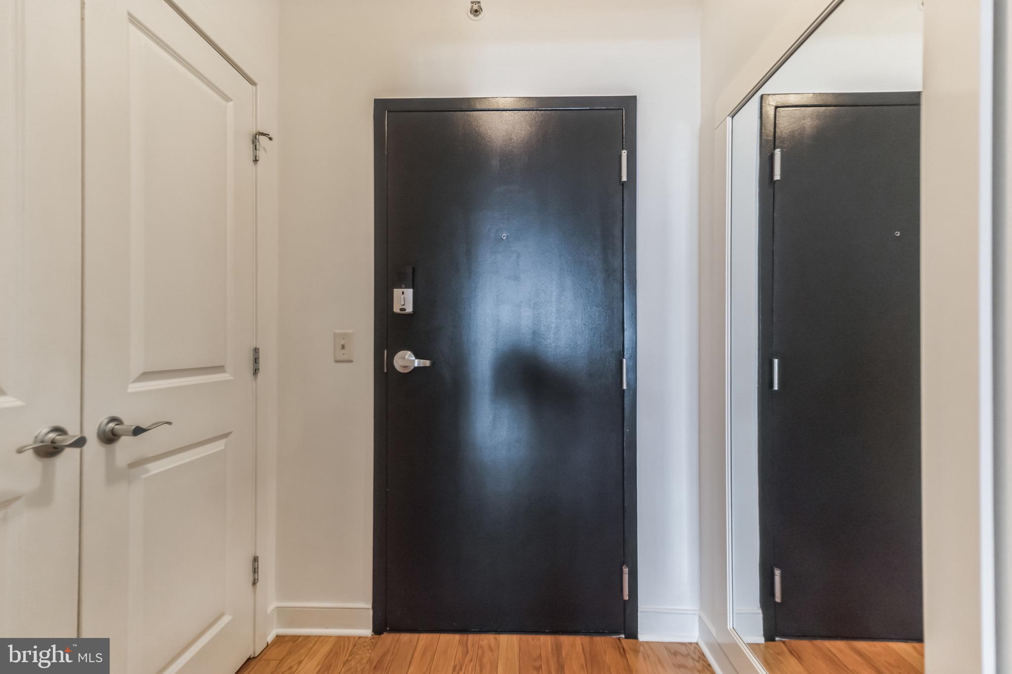 1117 10th Street Northwest, Unit 607 Washington, DC 20001 - Photo 12 of 20 a view of a bathroom from a hallway