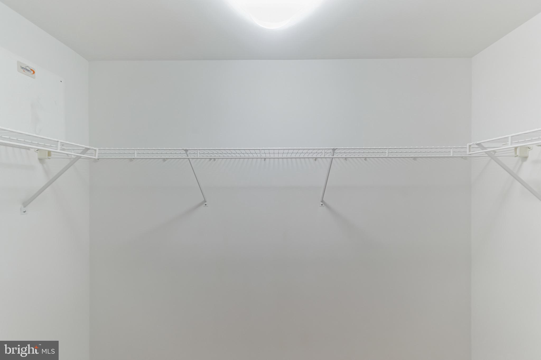 1117 10th Street Northwest, Unit 607 Washington, DC 20001 - Photo 15 of 20 a view of a room with racks on the wall