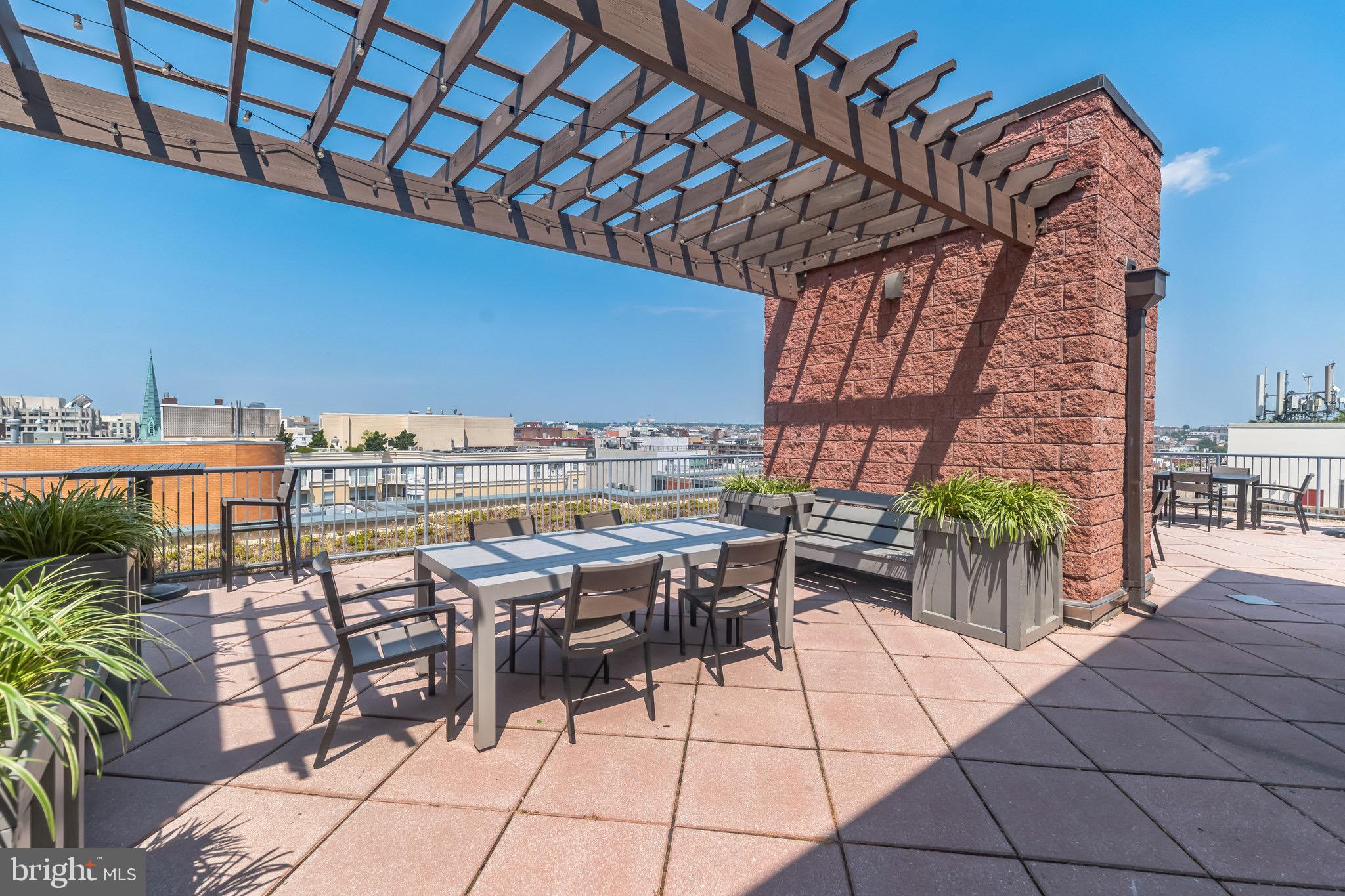 1117 10th Street Northwest, Unit 607 Washington, DC 20001 - Photo 18 of 20 a view of a chairs and table in patio