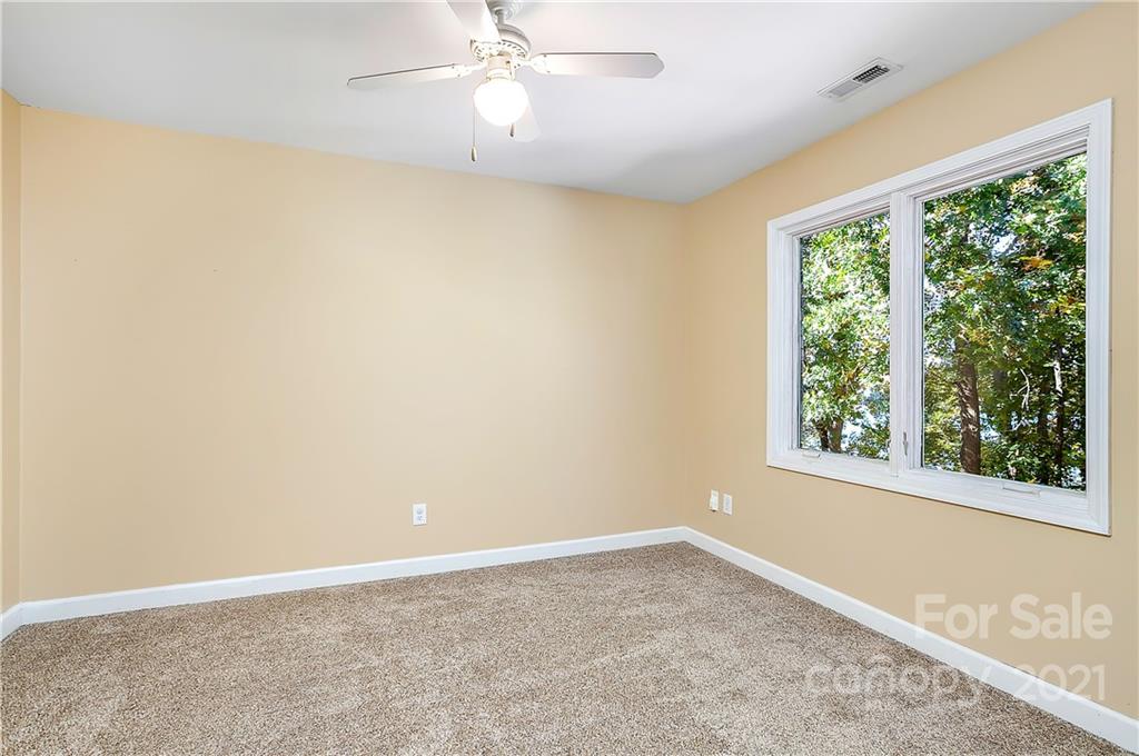 5628 Plantation Ridge Road Charlotte, NC 28214 - Photo 22 of 43 an empty room with a window