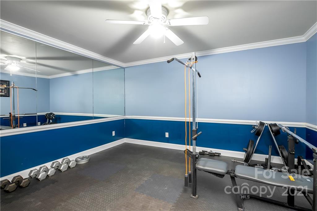 5628 Plantation Ridge Road Charlotte, NC 28214 - Photo 29 of 43 a kitchen with sink table and chairs