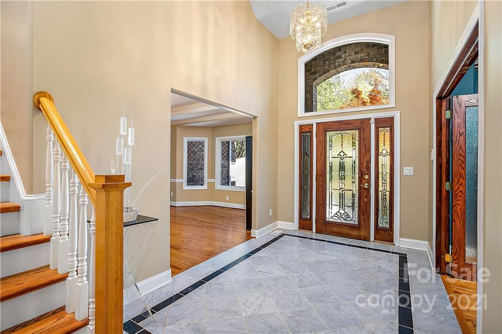 5628 Plantation Ridge Road Charlotte, NC 28214 - Photo 4 of 43 a view of an entryway with wooden floor