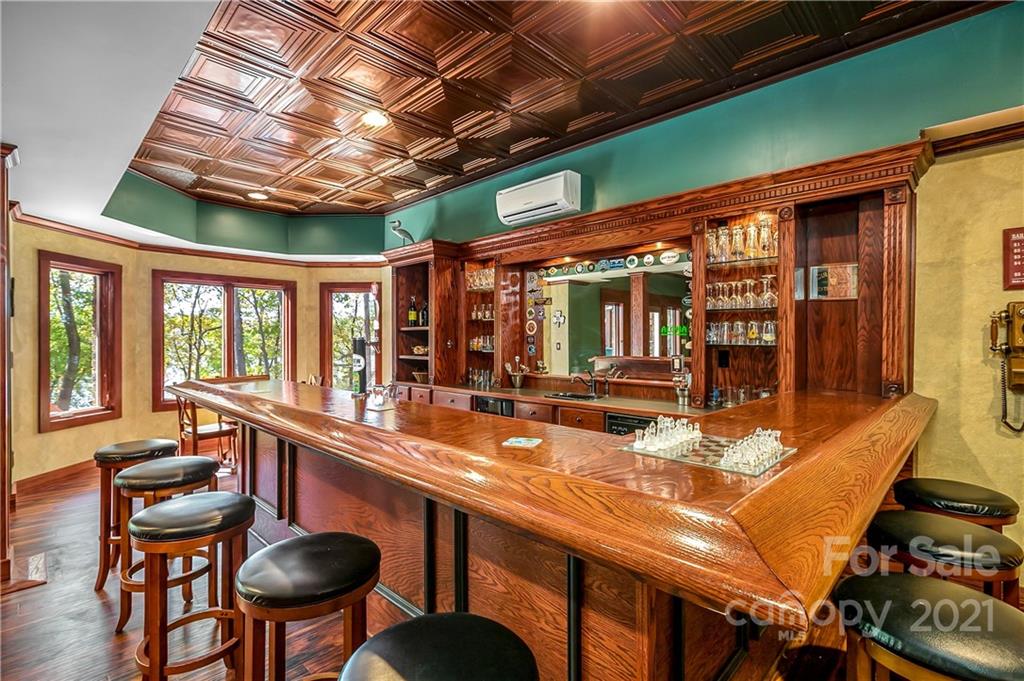 5628 Plantation Ridge Road Charlotte, NC 28214 - Photo 31 of 43 a dining room with furniture a chandelier and window
