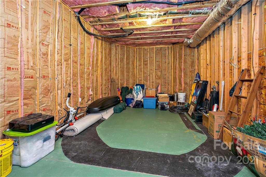 5628 Plantation Ridge Road Charlotte, NC 28214 - Photo 32 of 43 a room with musical instruments