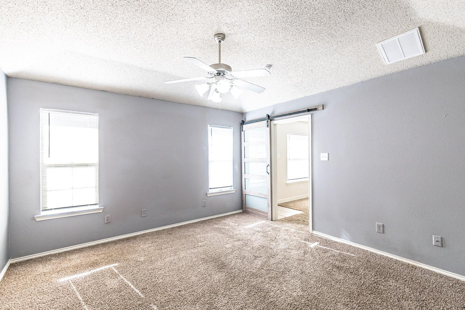 6903 8th Street Lubbock, TX 79416 - Photo 14 of 30 Primary Bedroom