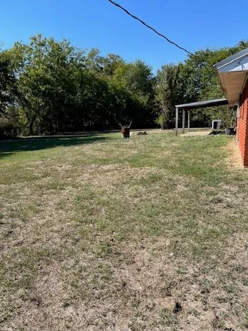 a view of outdoor space with garden