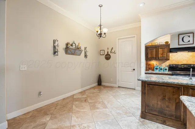 a view of a kitchen with a sink