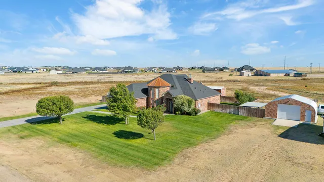 a view of a lake with a house