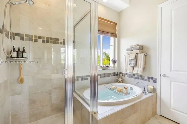 a bathroom with a sink and a shower