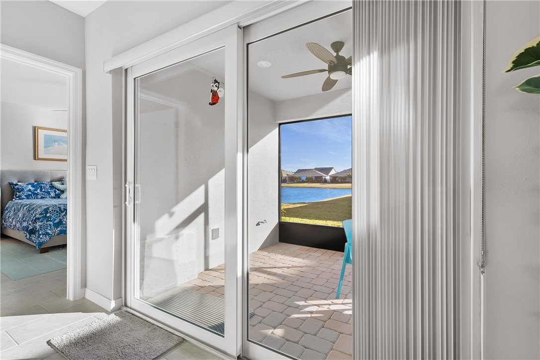 6187 Red Maple Manor Vero Beach, FL 32966 - Photo 13 of 31 a view of a hallway view with staircase